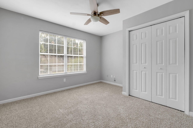 7326 Hollis St, Tallahassee, FL 32312 - unfurnished bedroom with carpet floors, a closet, and a ceiling fan