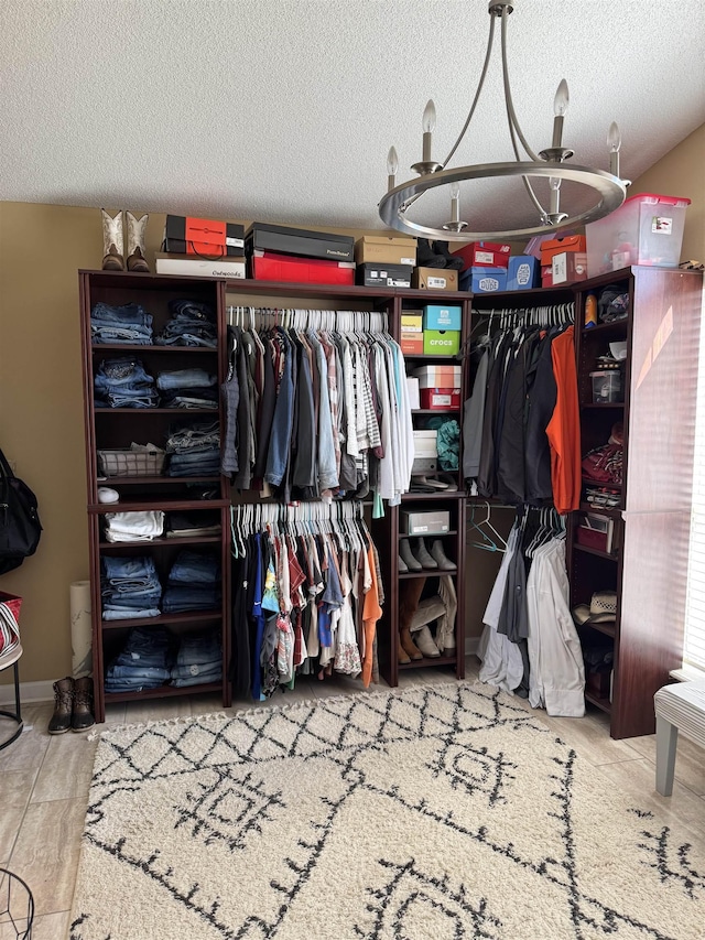 walk in closet featuring light wood-type flooring