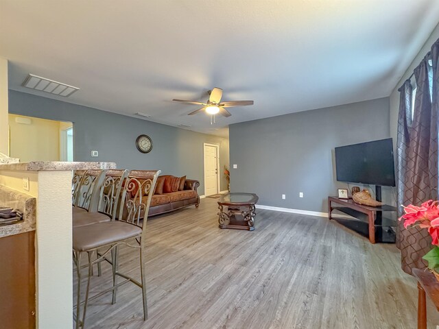 4641 Rivers Landing Way, Tallahassee, FL 32303 - living area with light wood-style flooring and ceiling fan