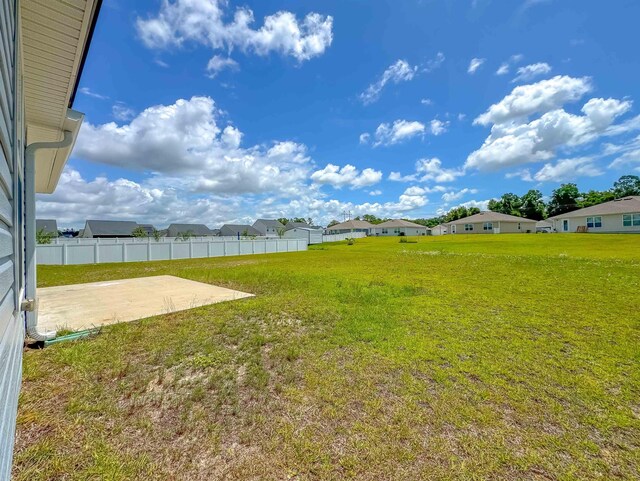 4641 Rivers Landing Way, Tallahassee, FL 32303 - view of yard with a patio and a residential view