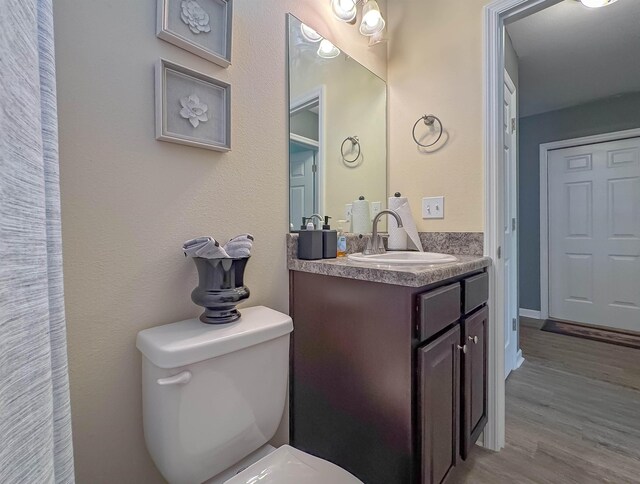 4641 Rivers Landing Way, Tallahassee, FL 32303 - bathroom featuring vanity and wood finished floors
