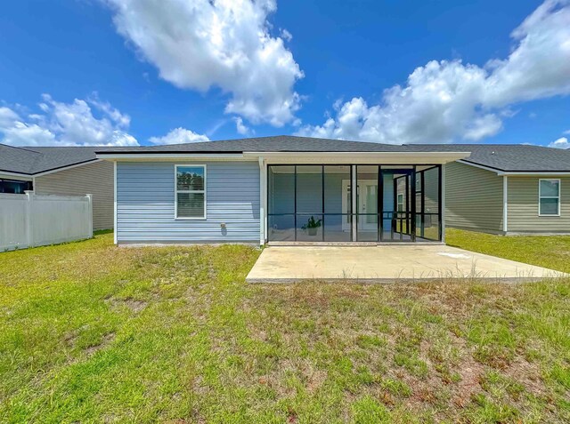 4641 Rivers Landing Way, Tallahassee, FL 32303 - rear view of property featuring a patio and a sunroom