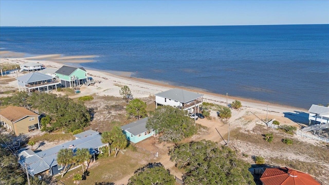 bird's eye view with a beach view and a water view