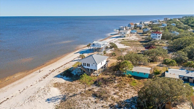 aerial view featuring a water view and a view of the beach