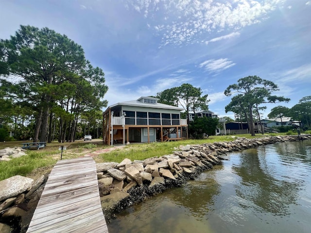 view of dock with a water view