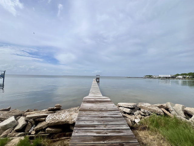 view of dock with a water view