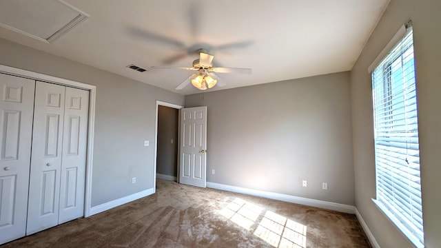 3320 Sugar Berry Way, Tallahassee, FL 32303 - unfurnished bedroom featuring a closet, ceiling fan, baseboards, carpet flooring, and visible vents
