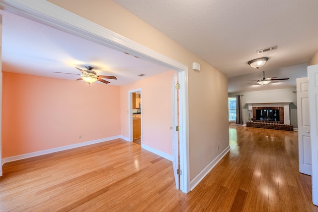 hall with hardwood / wood-style flooring