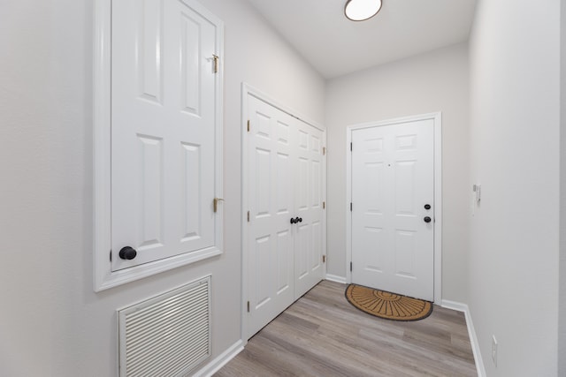 doorway featuring light wood-type flooring