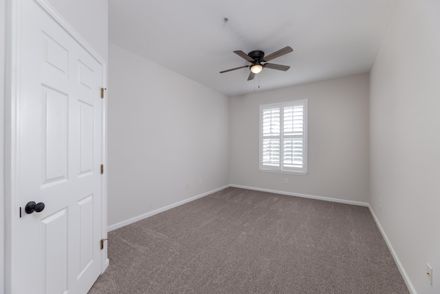 unfurnished room featuring carpet floors and ceiling fan