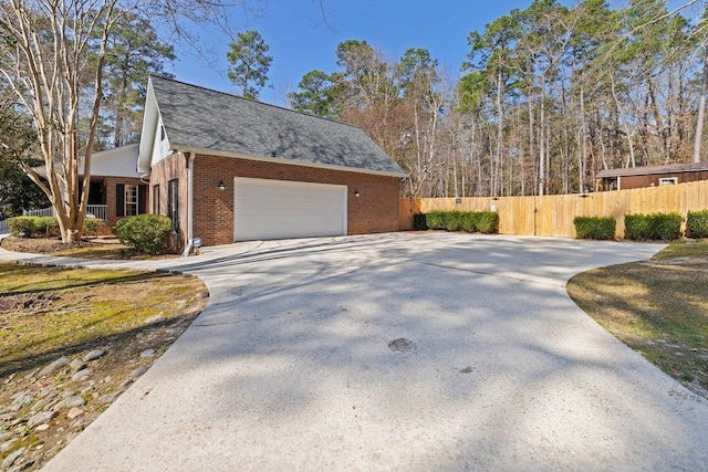 view of property exterior featuring a garage