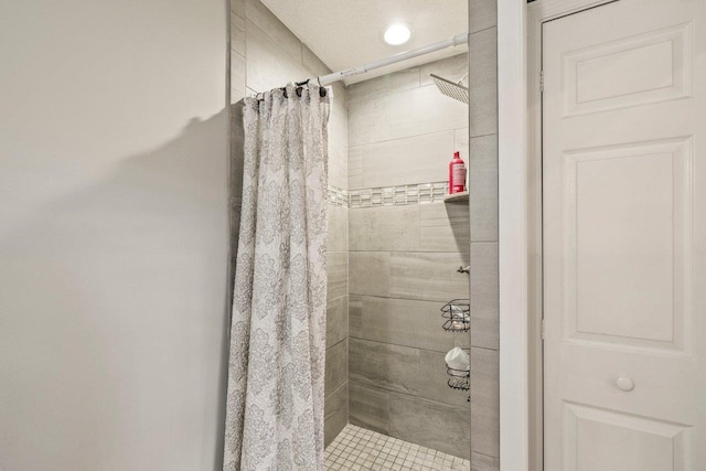 bathroom featuring walk in shower