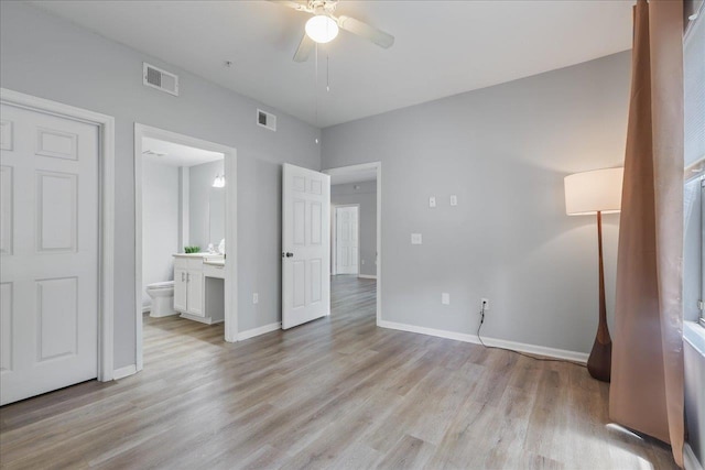 2801 Chancellorsville Dr Unit 1217, Tallahassee, FL 32312 - unfurnished bedroom with light wood-style flooring, connected bathroom, and ceiling fan