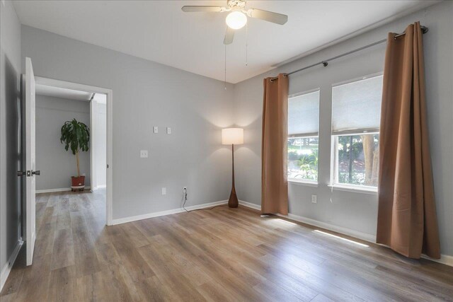 2801 Chancellorsville Dr Unit 1217, Tallahassee, FL 32312 - spare room featuring wood finished floors and ceiling fan
