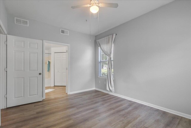 2801 Chancellorsville Dr Unit 1217, Tallahassee, FL 32312 - unfurnished bedroom featuring wood finished floors and ceiling fan