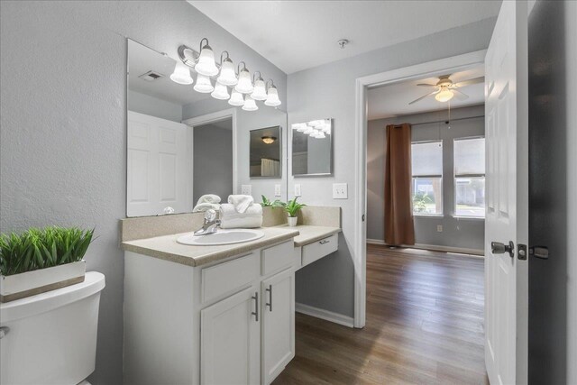 2801 Chancellorsville Dr Unit 1217, Tallahassee, FL 32312 - bathroom featuring vanity, wood finished floors, and a ceiling fan