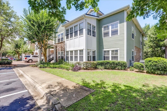 2801 Chancellorsville Dr Unit 1217, Tallahassee, FL 32312 - view of property with uncovered parking