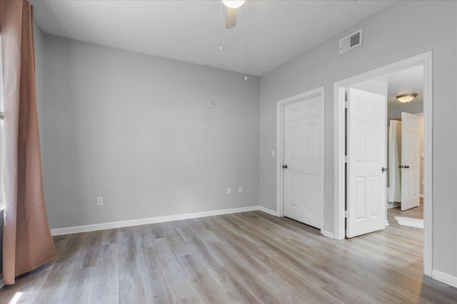 2801 Chancellorsville Dr Unit 1217, Tallahassee, FL 32312 - unfurnished bedroom with wood finished floors and a ceiling fan