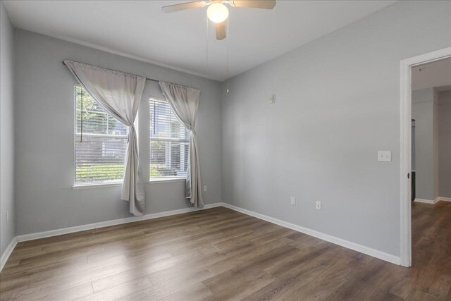 2801 Chancellorsville Dr Unit 1217, Tallahassee, FL 32312 - spare room with wood finished floors and a ceiling fan