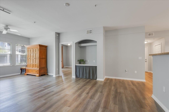 2801 Chancellorsville Dr Unit 1217, Tallahassee, FL 32312 - unfurnished living room with wood finished floors and ceiling fan