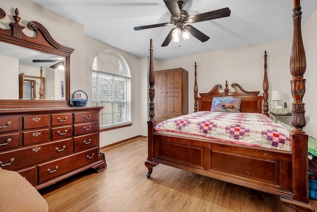 bedroom featuring light hardwood / wood-style flooring and ceiling fan