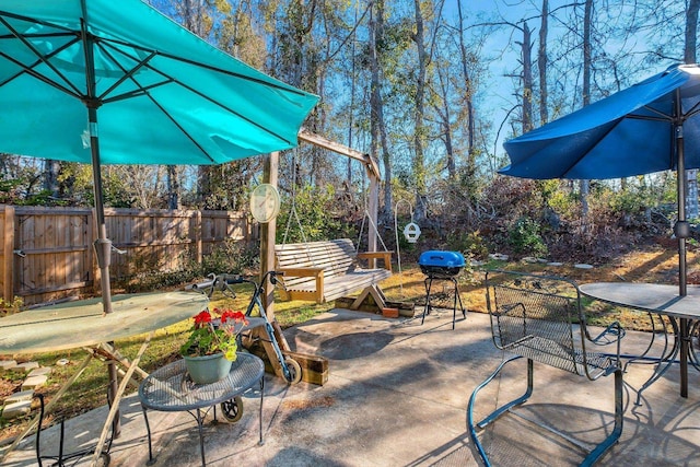 view of patio featuring a grill