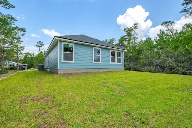 1695 Landing St, Carrabelle, FL 32322 - back of house with a lawn