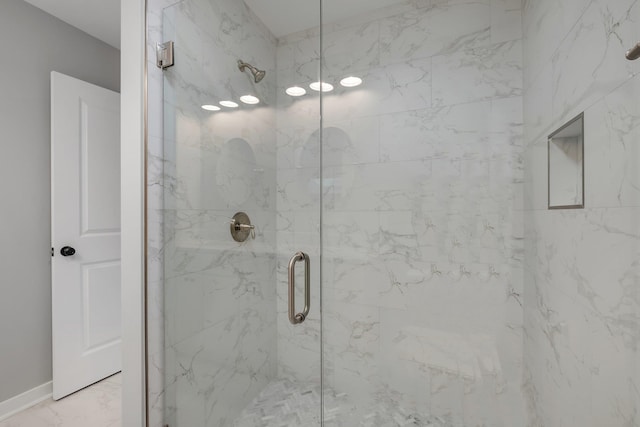 1695 Landing St, Carrabelle, FL 32322 - full bath featuring a marble finish shower and marble look tile flooring