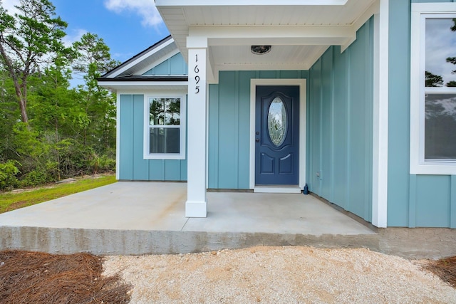 1695 Landing St, Carrabelle, FL 32322 - property entrance featuring board and batten siding