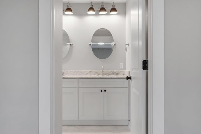1695 Landing St, Carrabelle, FL 32322 - bathroom with vanity and marble finish floors