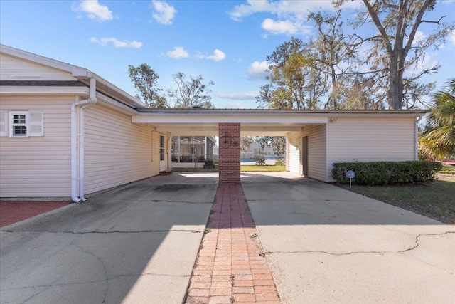 garage featuring a carport