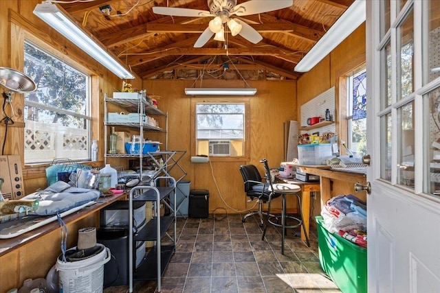 office space featuring wooden ceiling, lofted ceiling with beams, cooling unit, wooden walls, and ceiling fan