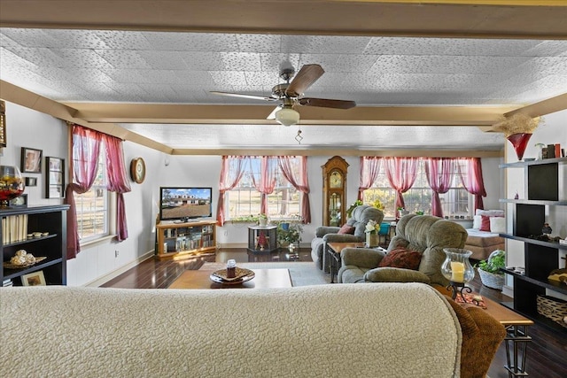 living room with ceiling fan and dark wood-type flooring