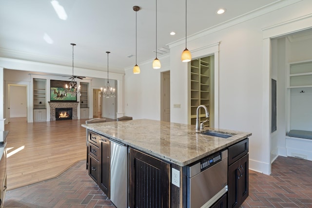 kitchen with dishwasher, brick floor, a sink, and crown molding