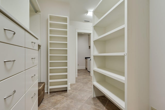 walk in closet featuring visible vents