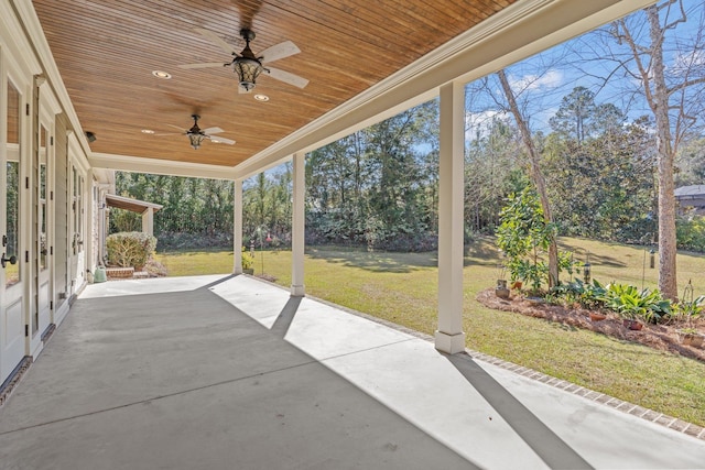 view of patio featuring ceiling fan