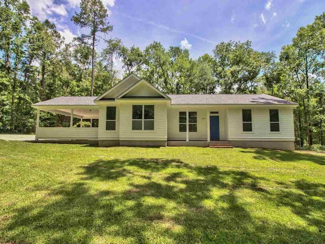 single story home with a front yard