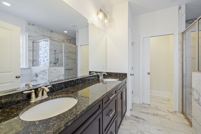 bathroom with vanity and walk in shower