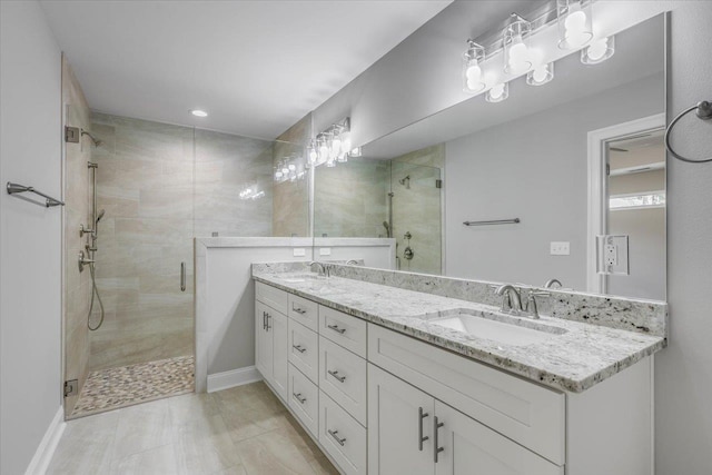 bathroom featuring vanity and walk in shower