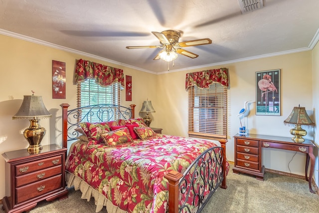 bedroom with ceiling fan, crown molding, light colored carpet, and a textured ceiling