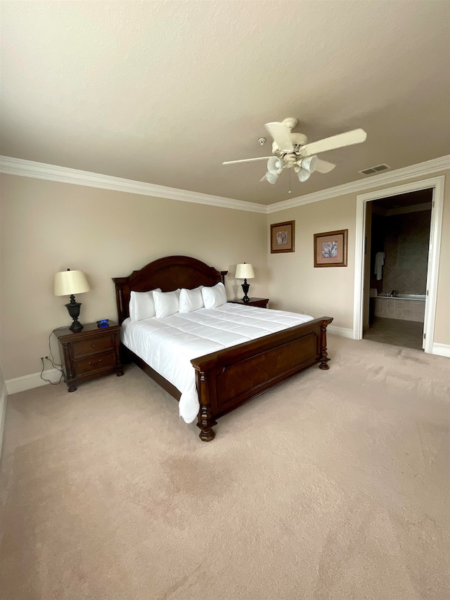 bedroom with ornamental molding, light colored carpet, and ceiling fan