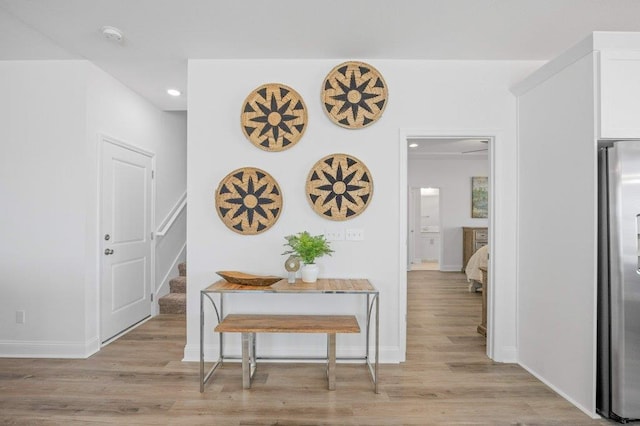 hallway featuring light hardwood / wood-style flooring