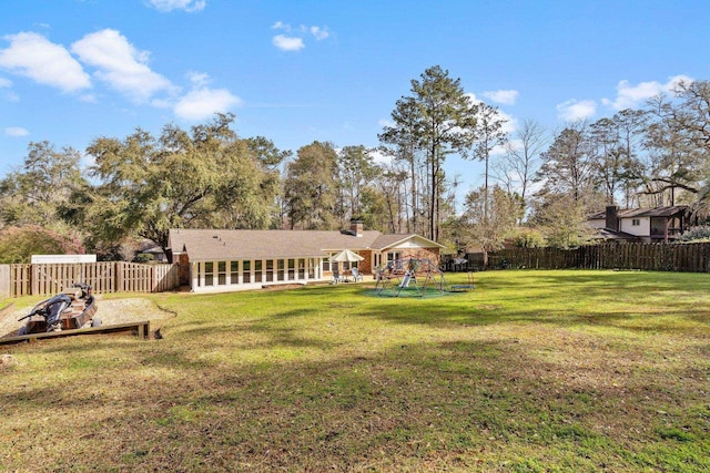 view of yard with a patio area and a fenced backyard