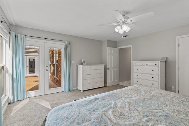 carpeted bedroom featuring french doors, a ceiling fan, and access to exterior