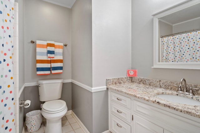 bathroom with ornamental molding, tile patterned flooring, vanity, and toilet