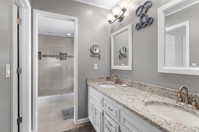 full bathroom featuring tile patterned flooring, a sink, a shower stall, and double vanity