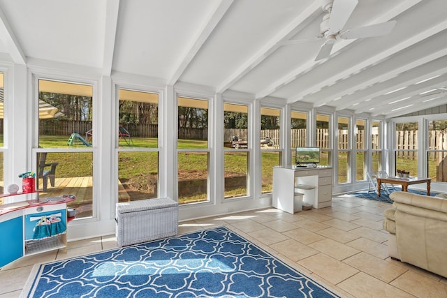 unfurnished sunroom with vaulted ceiling with beams and ceiling fan