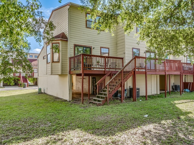 420 Indian Village Trl, Tallahassee, FL 32304 - back of house featuring stairs, a deck, a lawn, and cooling unit