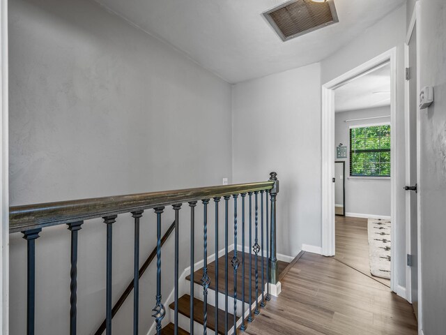 420 Indian Village Trl, Tallahassee, FL 32304 - stairs with wood finished floors and baseboards