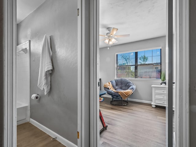 420 Indian Village Trl, Tallahassee, FL 32304 - bathroom featuring baseboards, wood finished floors, and a ceiling fan